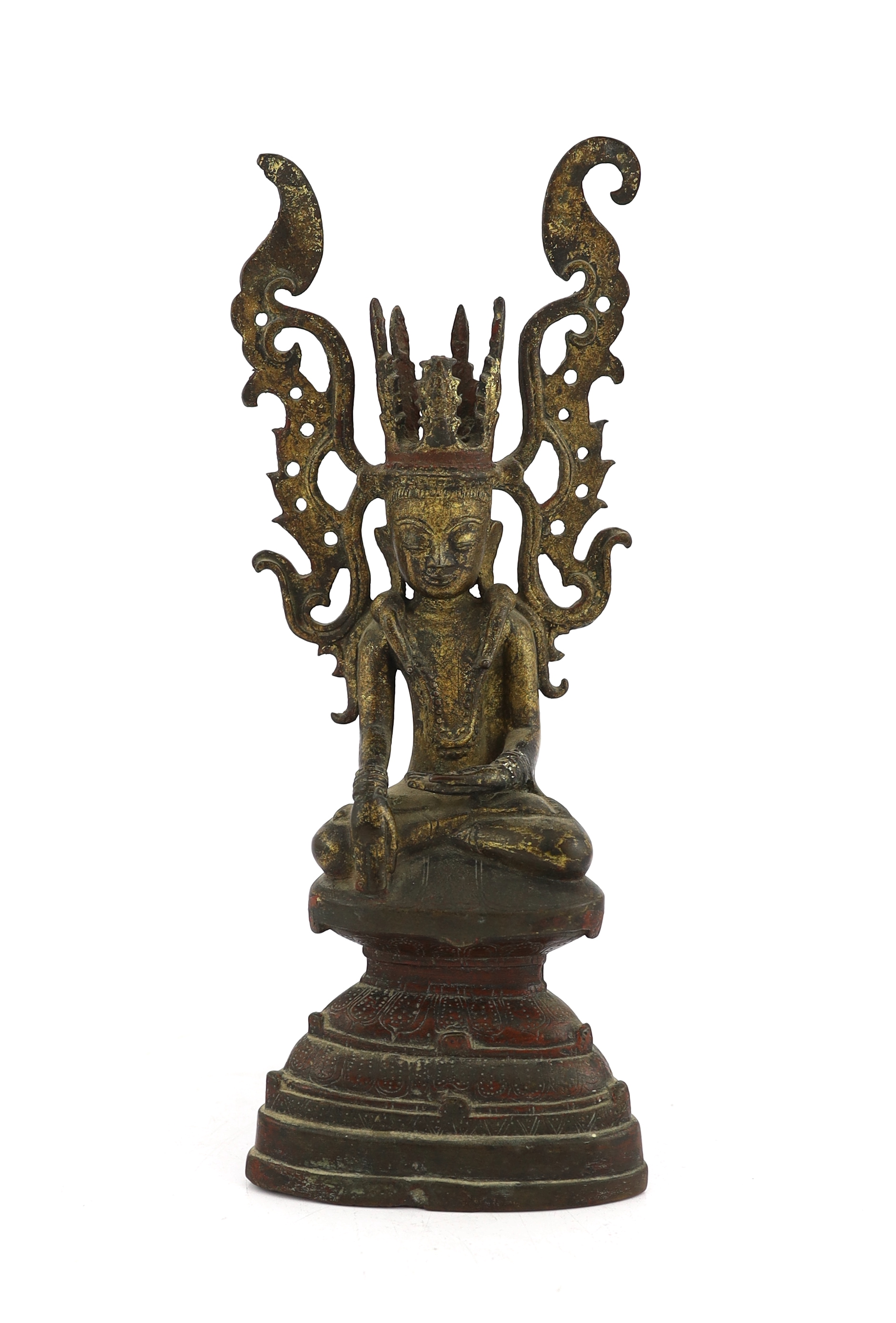 A Burmese gilt bronze seated figure of Jambupati Buddha on a throne, Shan, 17th-18th century, losses to headdress